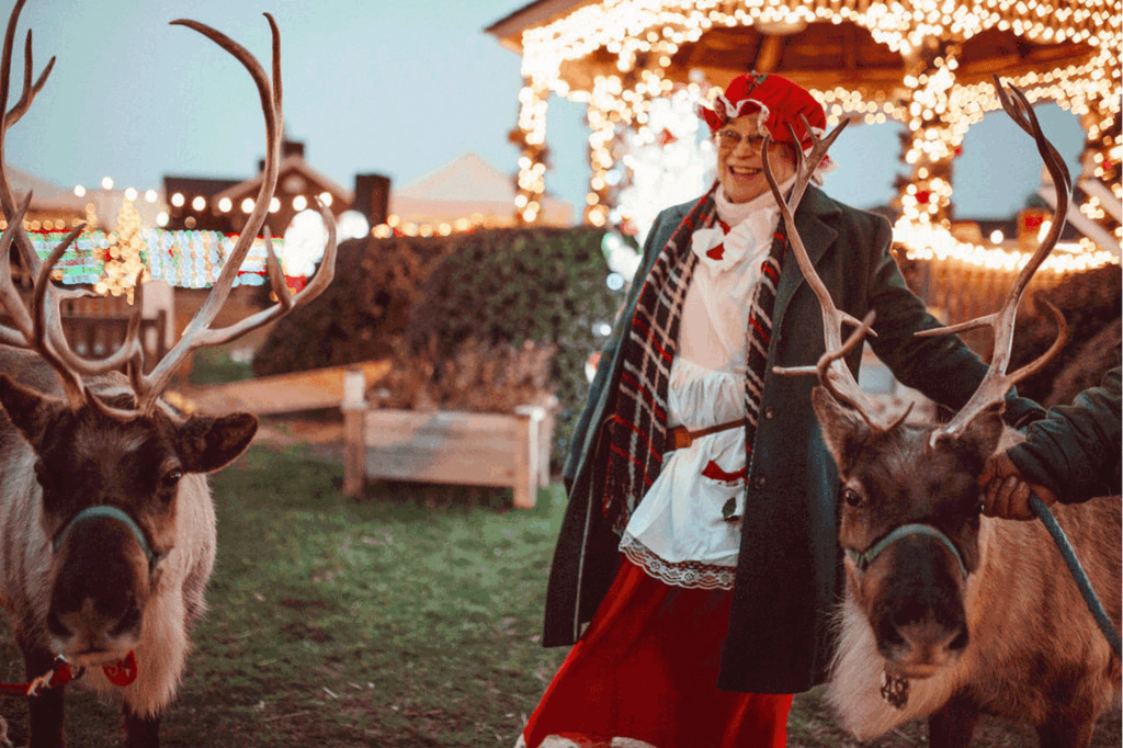 Mrs. Claus and two reindeer during the Magic of Montauk holiday fair