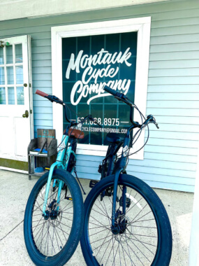 'Two electric bikes in front of Montauk Cycle Company