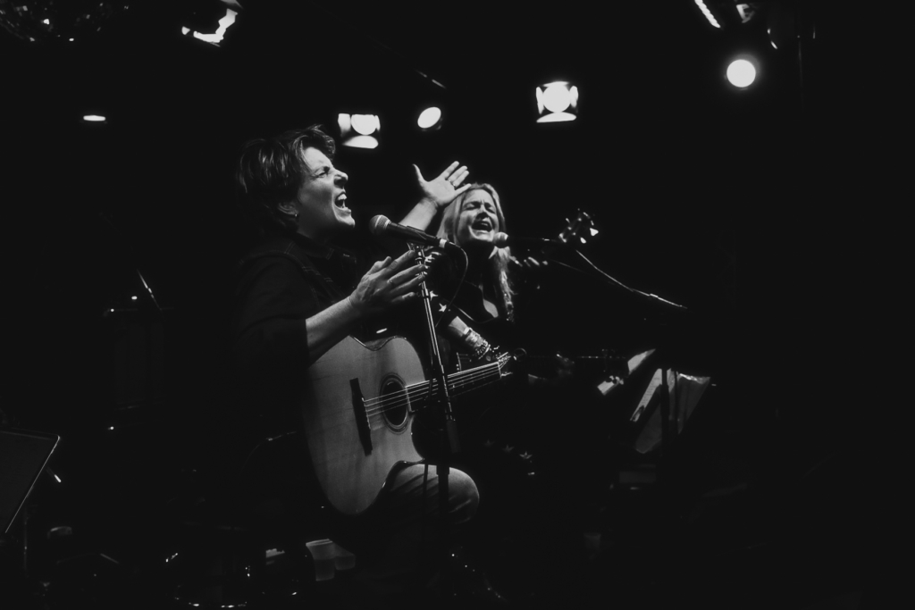 Image of Nancy Atlas and Inda Eaton performing on stage together.