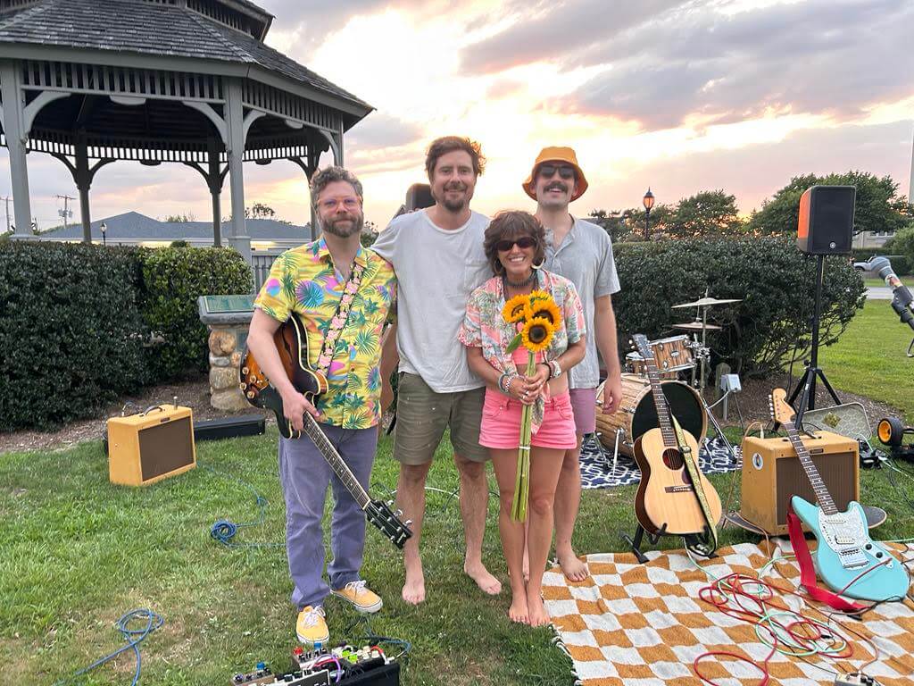 Annie Trezza on the green with her band